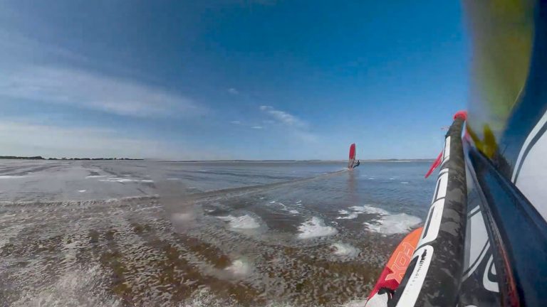 It is surreal blasting across this glassy flat water in a strong breeze